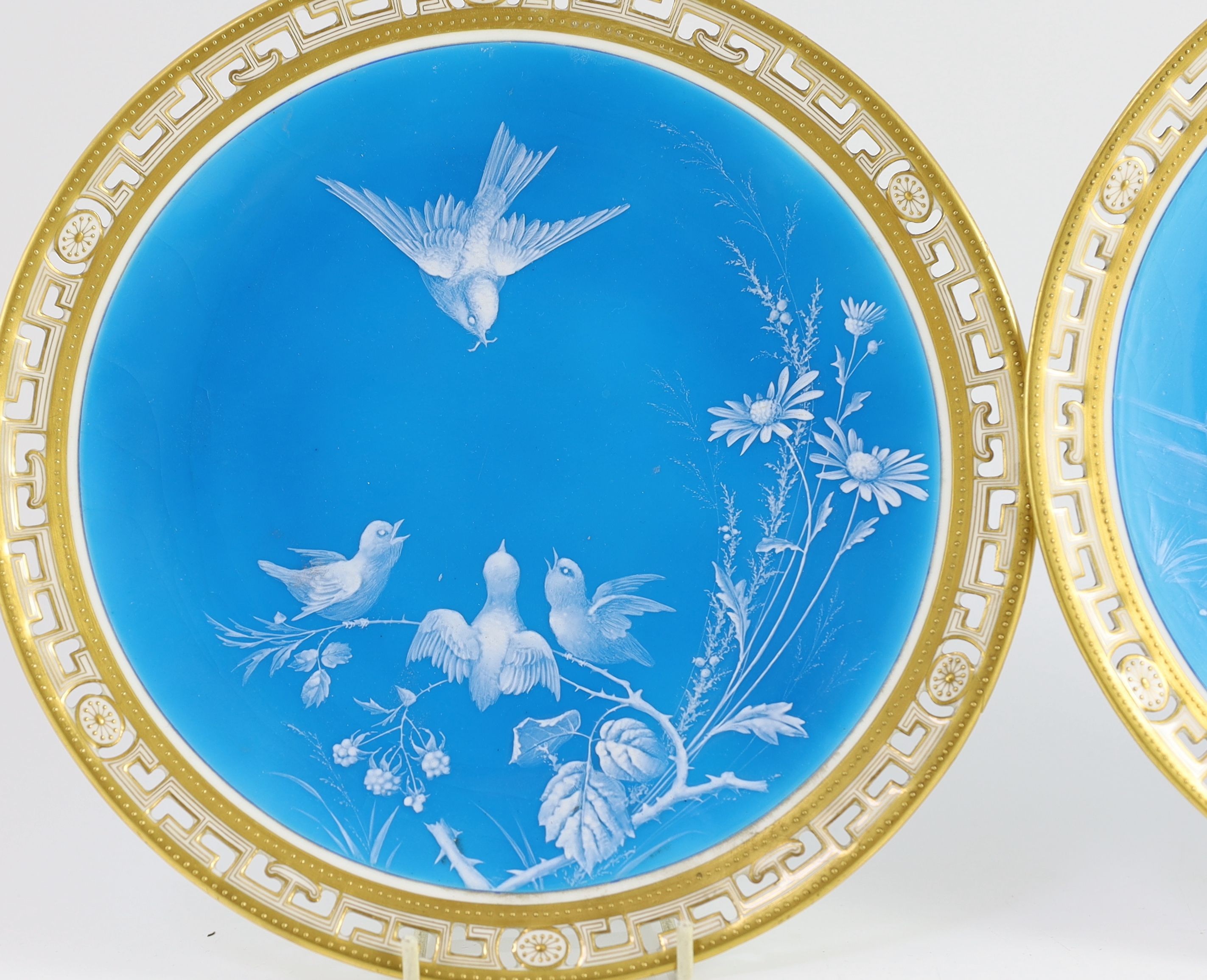 A pair of Minton ‘Limoges enamel’ cabinet plates, attributed to Desire Leroy, c.1877, 24cm diameter, One plate with small section of rim broken and glued